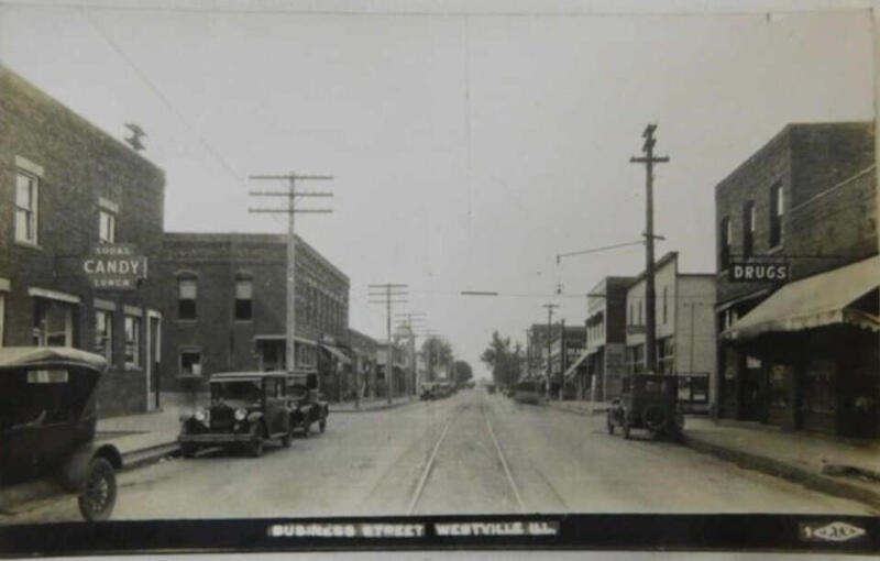 State St with Candy &amp; Drug Stores Postcard